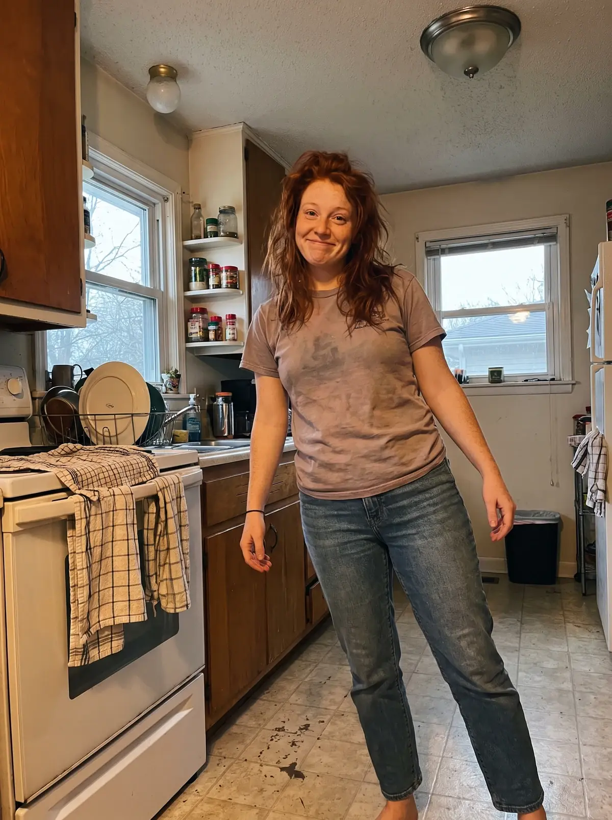 The photo we worked from: in her kitchen, barefoot, in a t-shirt and jeans.